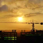 Construction,Crane,At,A,Construction,Site,At,Dawn.